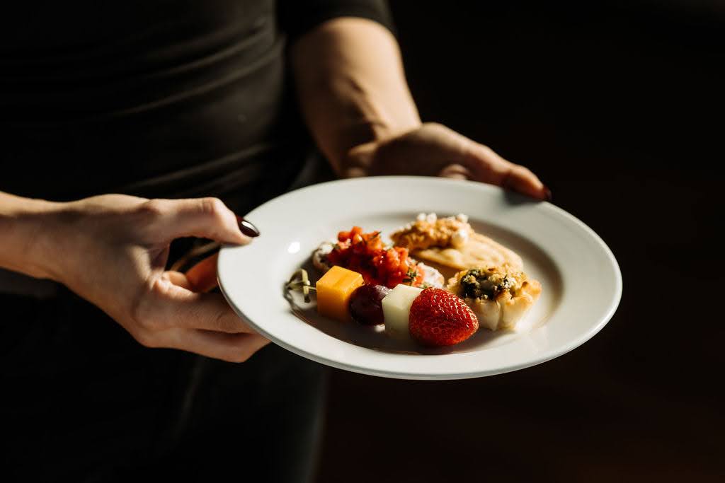 Featured image for post: How Corporate Catering Can Elevate Client Presentations & Pitches